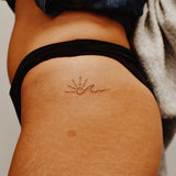 Sun With Wave Tattoo