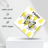 butterfly surrounded by flowers tattoo