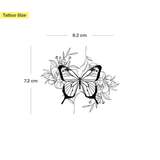 butterfly surrounded by flowers tattoo