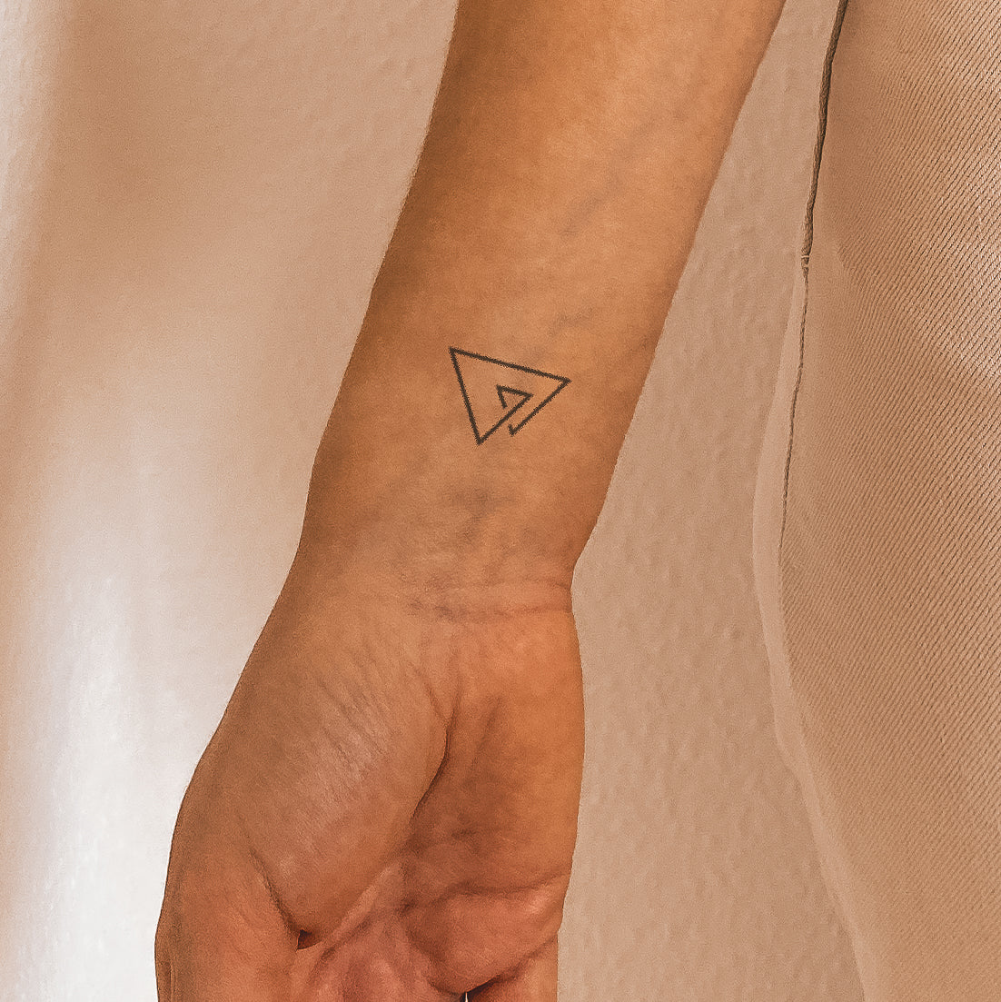 triangle wrist tattoo