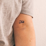 Lying Panda Tattoo