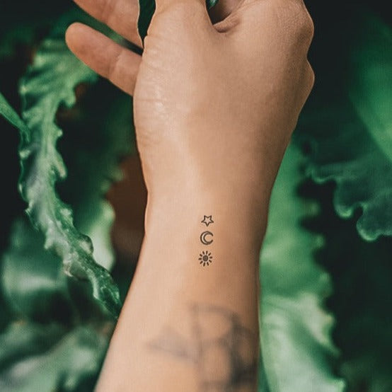 moon and sun tattoo wrist