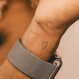 Small Stegosaurus Tattoo