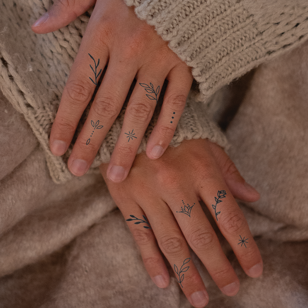 Floral Finger Tattoos