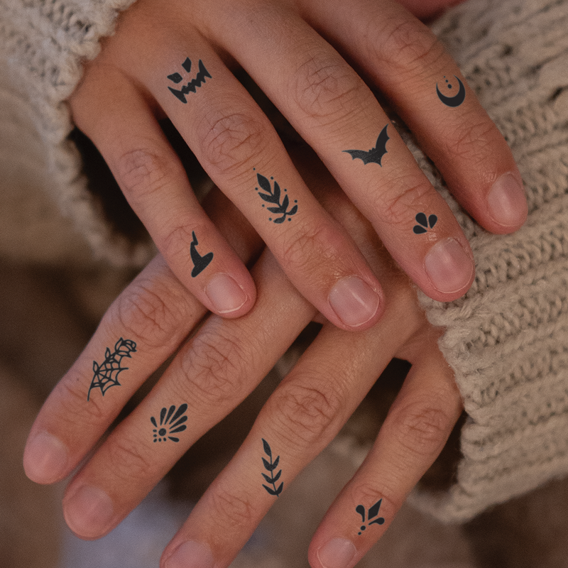 Minimal Halloween Finger Tattoos