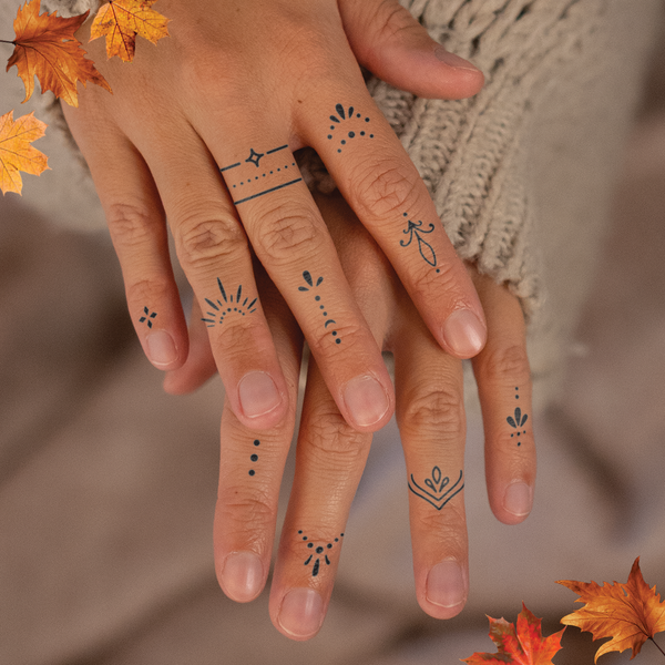 Ornamental Finger Tattoos