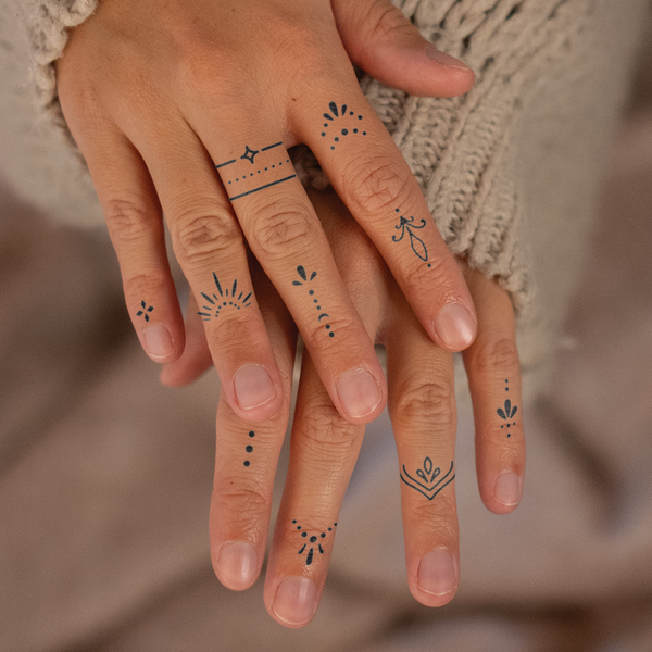 Ornamental Finger Tattoos