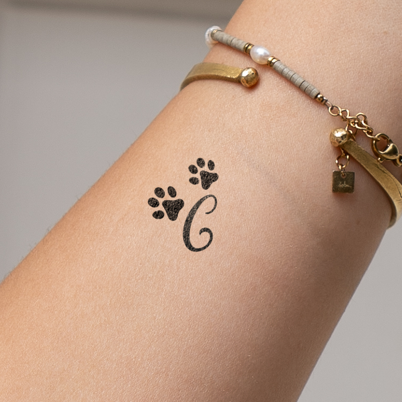 Paws with initials tattoo (A-Z)