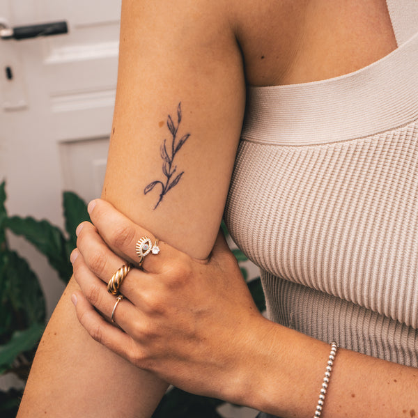 Branch With Leaves Tattoo 
