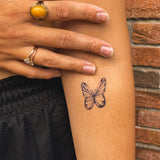 Fine Butterfly Tattoo 