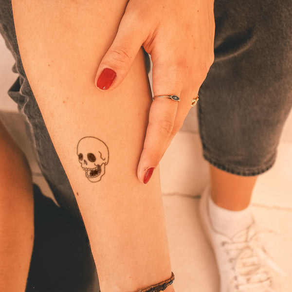 skull wrist tattoo for girls